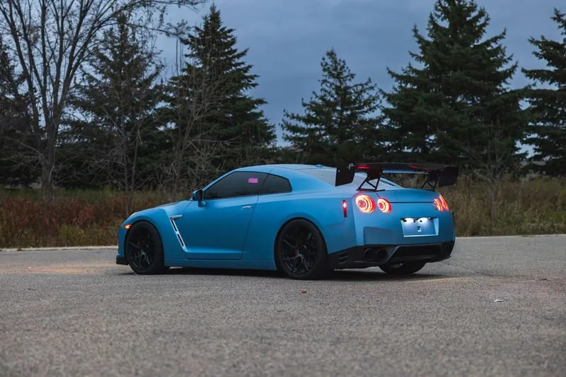 Blue Nissan GT-R parked outside