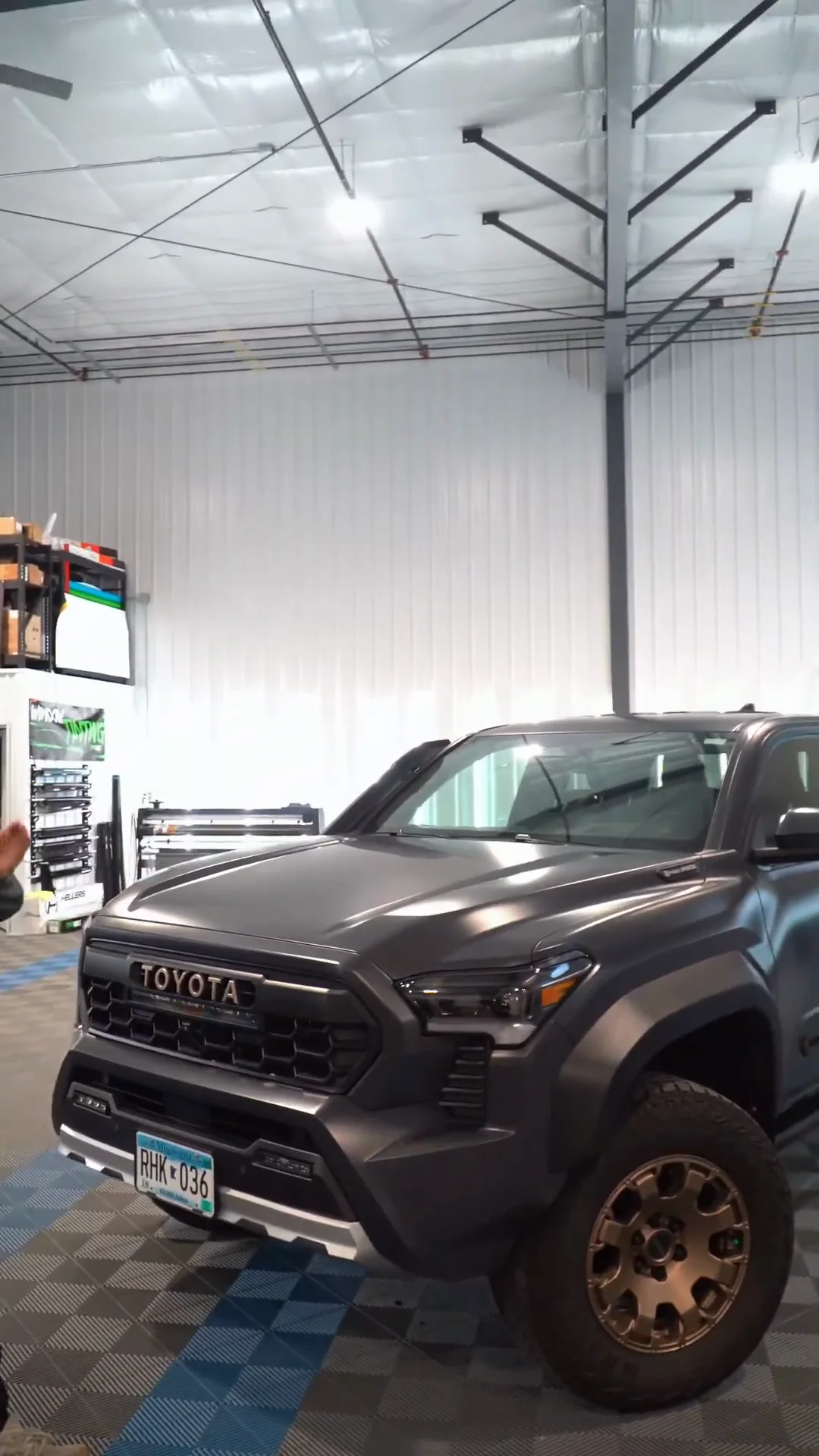 Matte gray Toyota Tacoma in the shop
